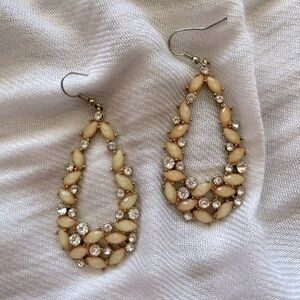 Pale pink/peach tear drop shaped earrings with crystals, gold backing